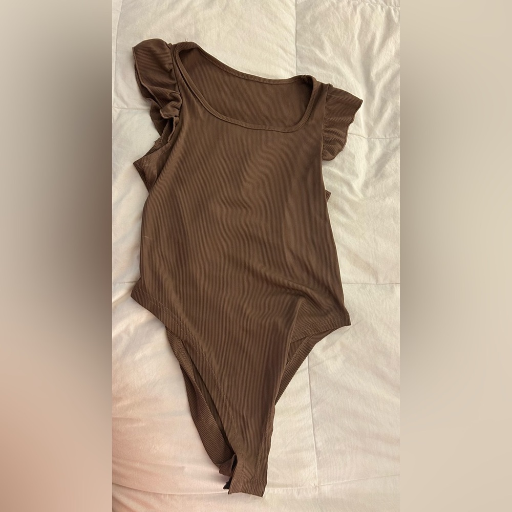 Brown body suit